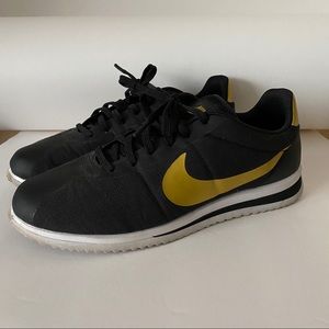 nike cortez ultra black gold